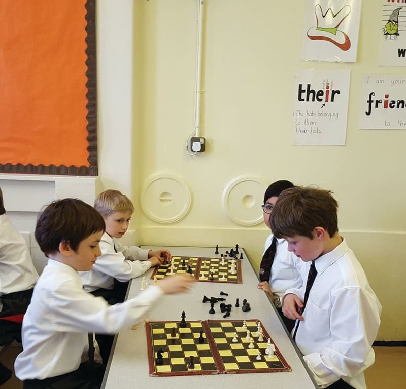 boys playing chess