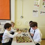 boys playing chess